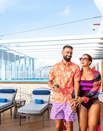 A couple enjoying a Carnival cruise